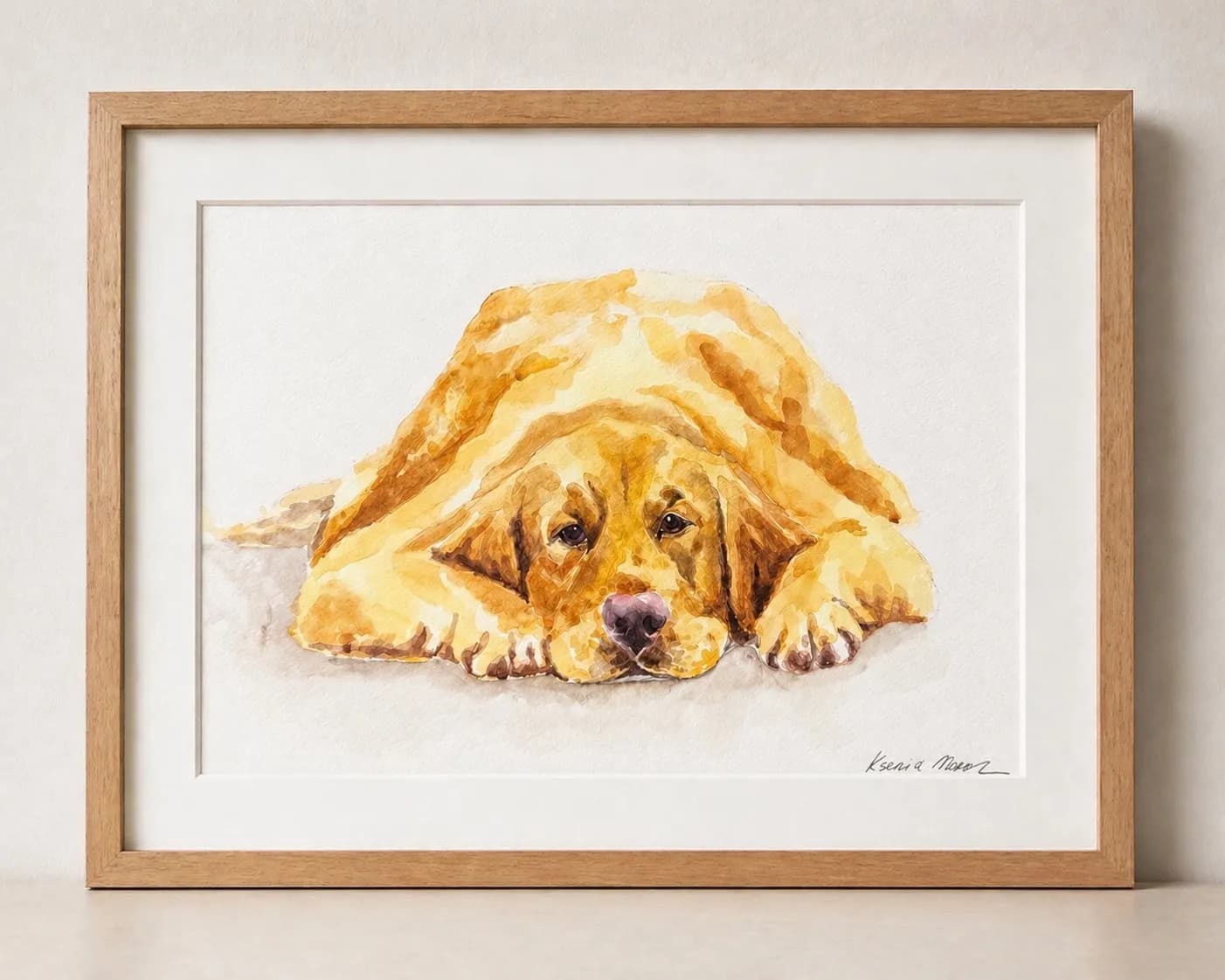 Hand-painted watercolor portrait of a golden retriever resting, signed by artist Ksenia Moroz